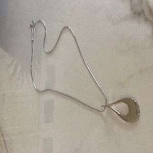 Long metal teardrop pendant